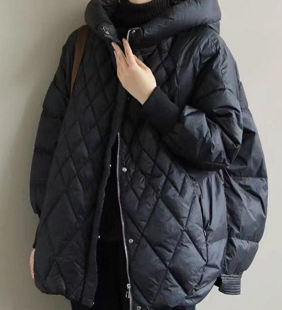 Vatteret quiltet jakke med hætte – varm komfort og moderne hverdagsstil