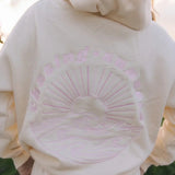 Oversize hoodie til kvinder med strandinspireret print