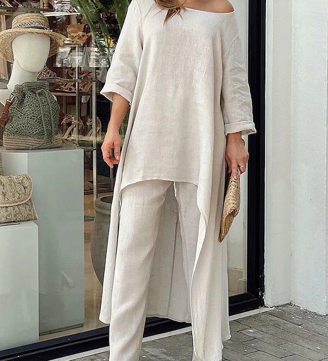 Løs asymmetrisk tunika sæt med brede bukser – elegant og komfortabelt