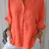 Løs Skjortebluse med Oprullede Ærmer – Let og Elegant Hverdagsstil