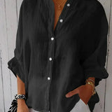 Løs Skjortebluse med Oprullede Ærmer – Let og Elegant Hverdagsstil