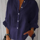 Løs Skjortebluse med Oprullede Ærmer – Let og Elegant Hverdagsstil