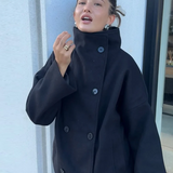 Oversized Frakke med Høj Krave og Moderne Minimalistisk Stil