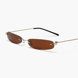 Minimalistiske Solbriller – Rimless Design & Guldstænger