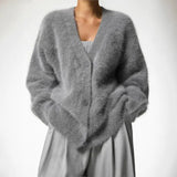 Fluffy cardigan dame – blød og elegant strik