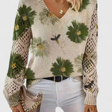 Blomstret V-Hals Bluse med Blondeærmer – Elegant og Feminin Stil