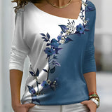 Elegant bluse med blomsterprint og asymmetrisk hals – Trekvartærmer