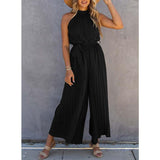 Elegant Halterneck Jumpsuit med Bælte og Plissering