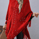 Strikket poncho med perler og frynser – elegant og varm dameponcho