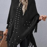 Strikket poncho med perler og frynser – elegant og varm dameponcho