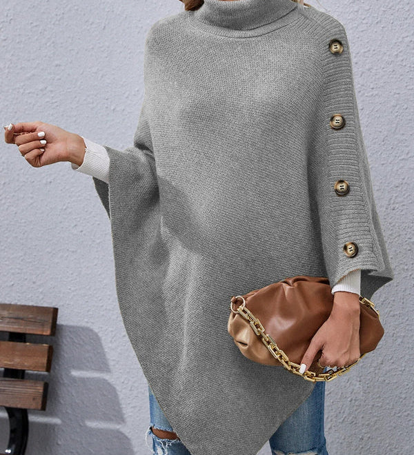 Poncho dame med knapper og høj hals