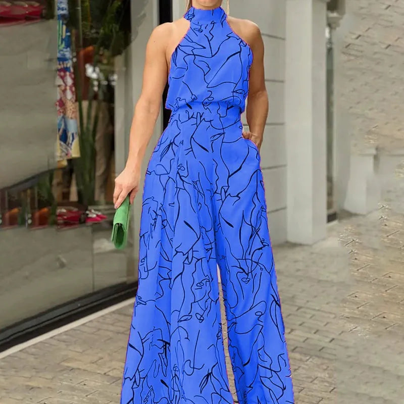 Halterneck jumpsuit med vidde ben og abstrakt print