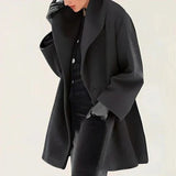 Elegant oversized polyesterjakke med varm komfort og tidløst look