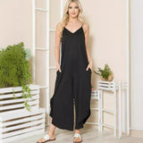 Casual jumpsuit med spaghetti stropper og lommer
