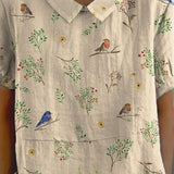 Skjortebluse med fugleprint og krave – Naturlig og let sommerstil