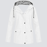 Vandtæt regnjakke med hætte til damer – stilfuld beskyttelse i al slags vejr