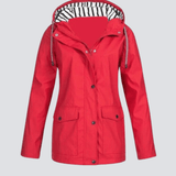 Vandtæt regnjakke med hætte til damer – stilfuld beskyttelse i al slags vejr