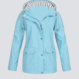 Vandtæt regnjakke med hætte til damer – stilfuld beskyttelse i al slags vejr