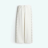 Wide-leg jeans med nitter og høj talje – edgy og moderne denimlook