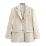 Kvindelig cremefarvet blazer – minimalistisk og klassisk design