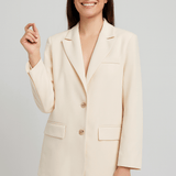 Kvindelig cremefarvet blazer – minimalistisk og klassisk design