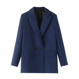 Kvindelig blazer i kongeblå – dobbeltknappet og iøjnefaldende stil