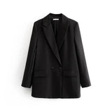 Kvindelig blazer i kongeblå – dobbeltknappet og iøjnefaldende stil