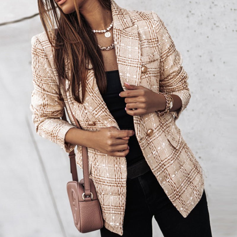 Ternet blazer med guldknapper og klassisk snit