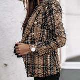 Ternet blazer med guldknapper og klassisk snit