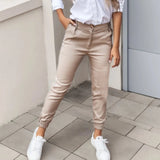 Beige tapered bukser til kvinder – elegant med elastiske ankler
