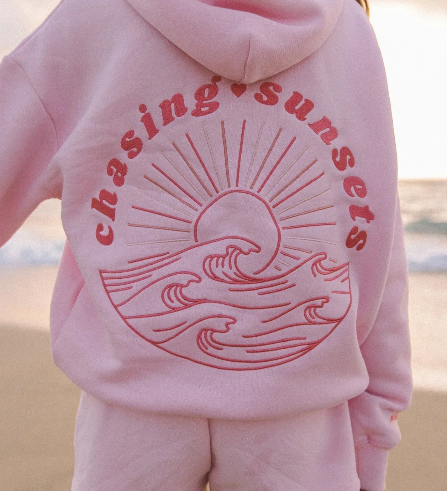 Oversize hoodie til kvinder med strandinspireret print