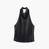 Halterneck top i satinlook med elegant fald