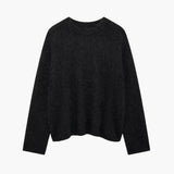 Blød striktrøje med løs pasform og tidløst design