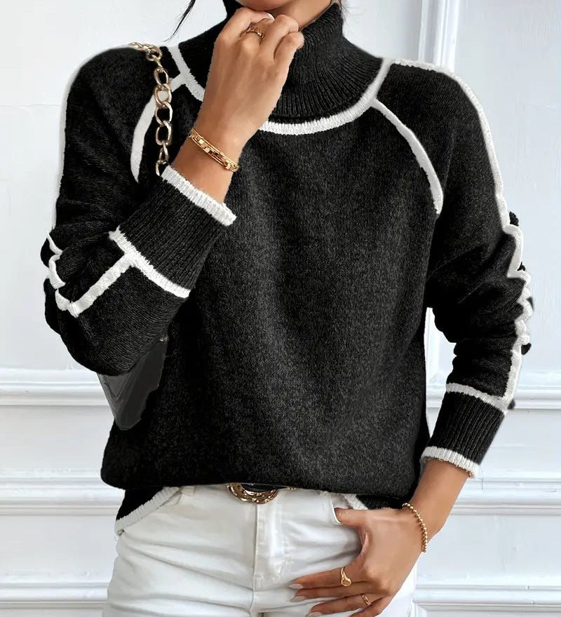 Striktrøje med høj hals og kontrastdetaljer