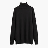 Oversized striktrøje med høj hals og blød komfort