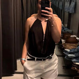 Halterneck bodystocking med dyb udskæring og elegant fald